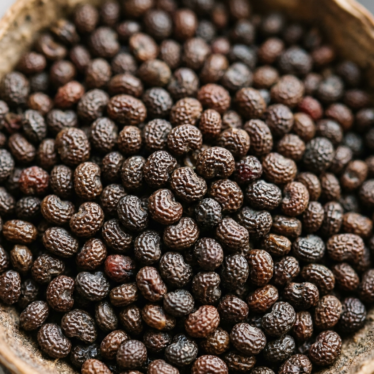 Close-up texture of blue-gray papaver somniferum seeds.