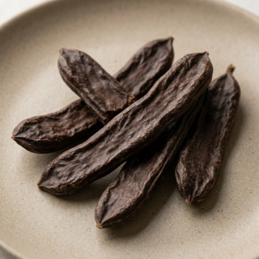 Poppy pods being processed into fine poppy powder in four stages.